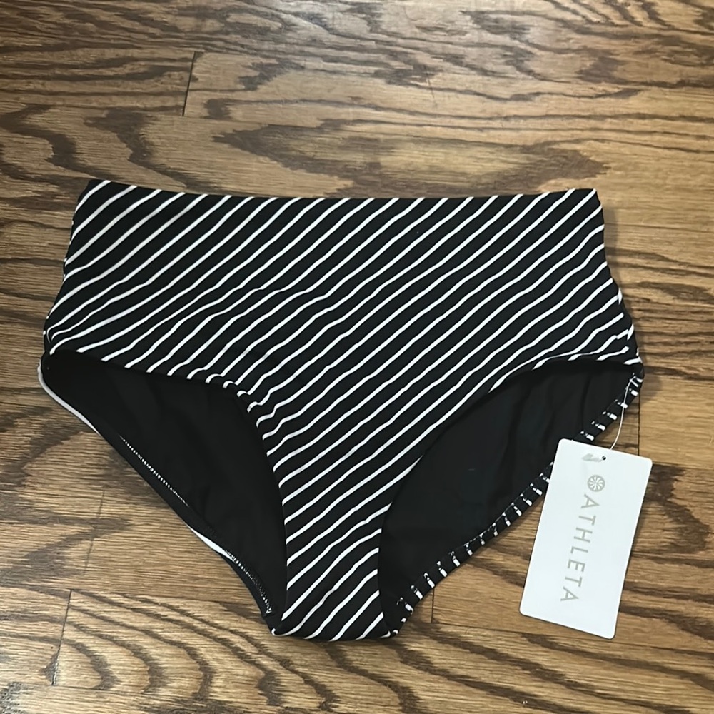 Black and white high waisted swim bottom. Athleta